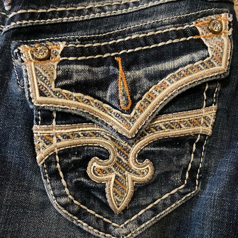 25 Rock Revival Boot Cut Jeans